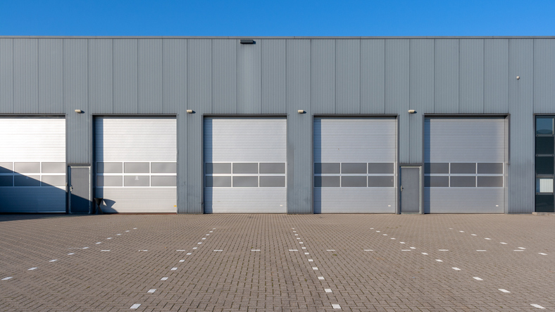 When to Call a Commercial Garage Door Company for Maintenance