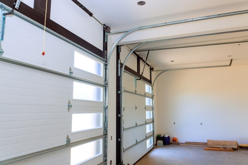 Why Timely Garage Door Replacement Prevents Breakdowns