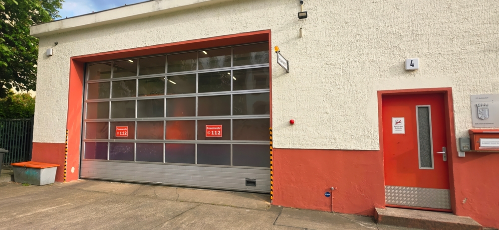 Professional garage door opener services for home protection with technician inspecting and securing system