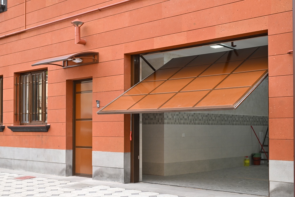 technician performing smart care habits for garage door opener maintenance