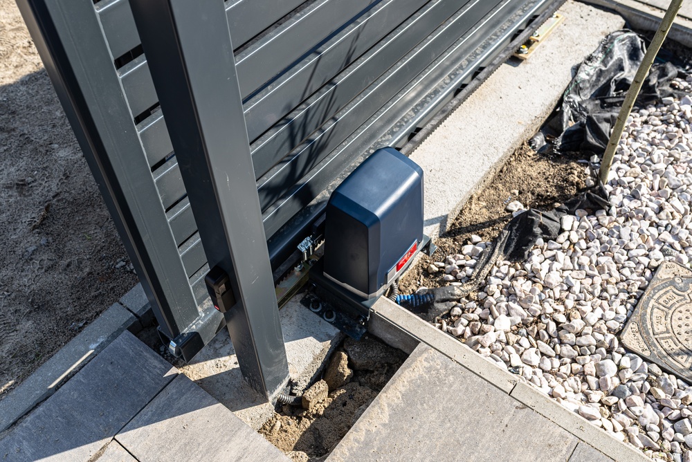 Tesla vehicle using geofencing technology to sync garage door automation at a residential home