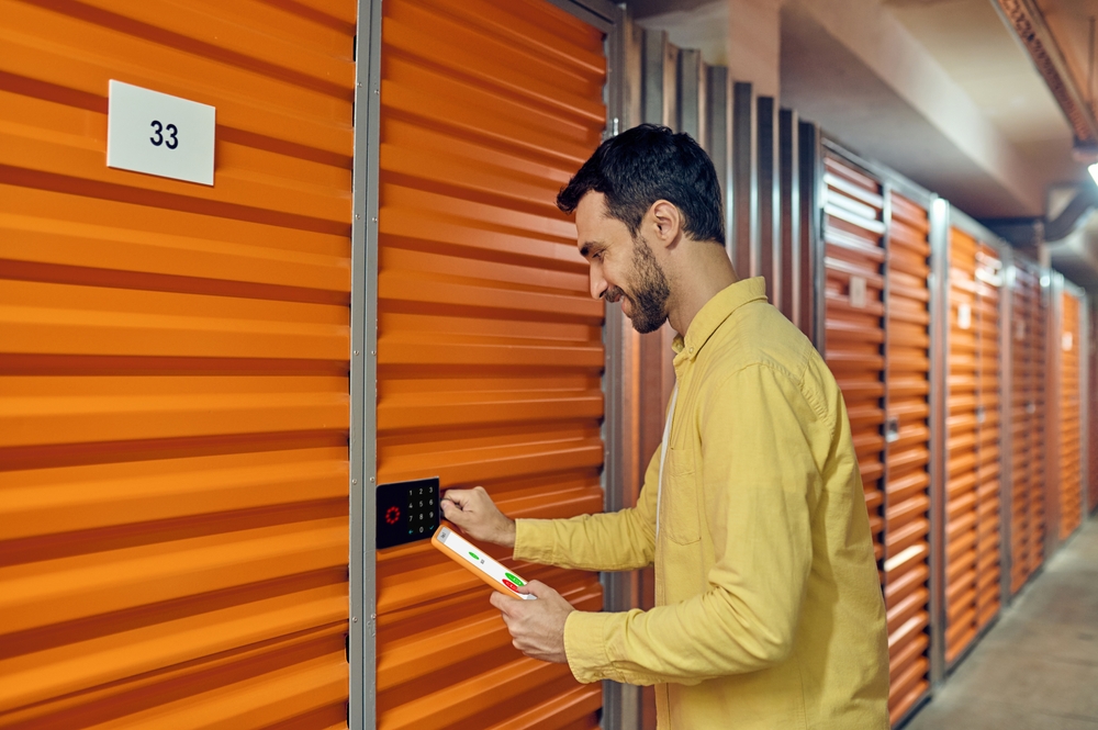 Homeowner using an Apple Watch to monitor garage door open status and receive smart alerts