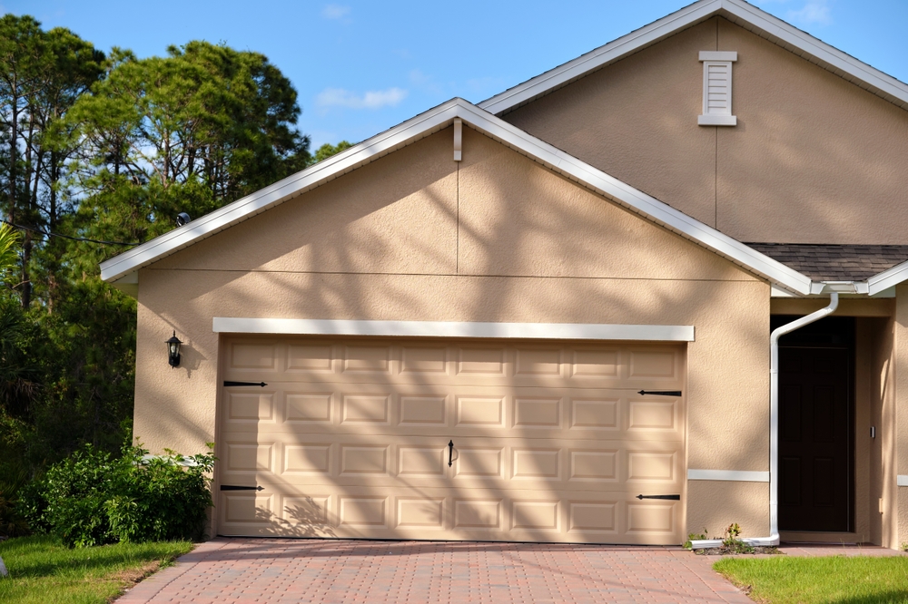 Modern home featuring a stylish garage door that complements the exterior color palette