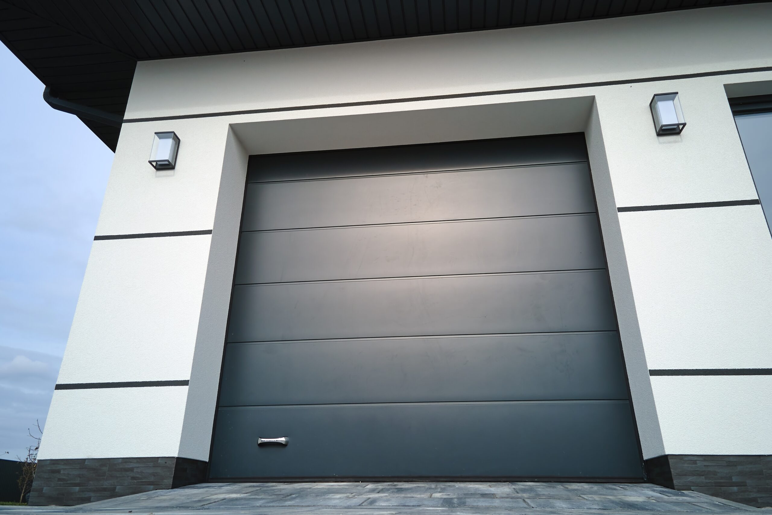 Energy-efficient eco-friendly garage door installed on a modern sustainable home