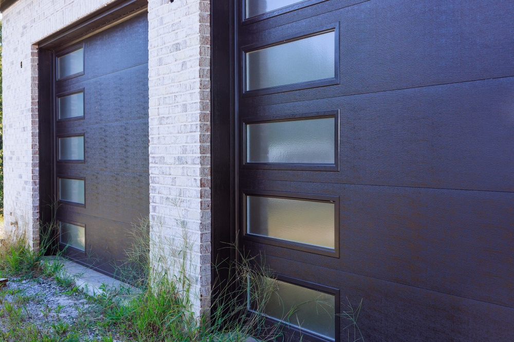 Modern garage door equipped with advanced security features including smart controls and automatic locking